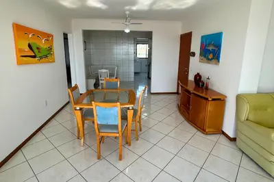 Uma área de estar em Apartamento com vista mar frente a avenida principal