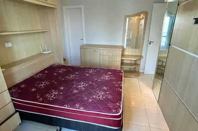 Uma cama ou camas num quarto em Cobertura com piscina e vista mar