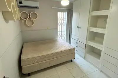 Uma cama ou camas num quarto em Cobertura com piscina e vista mar