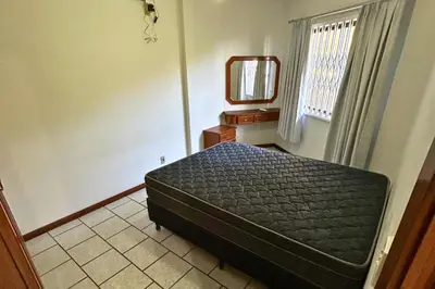 Uma cama ou camas num quarto em Sobrado na quadra mar, Praia de Bombas