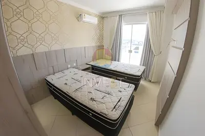 Uma cama ou camas num quarto em Cobertura com vista mar e excelente localização
