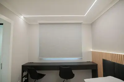 Uma cama ou camas num quarto em Safira