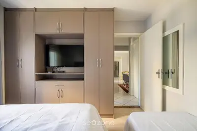 Uma cama ou camas num quarto em Apto 2Q 100m da praia em Balneário Camboriú ESD143