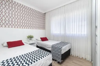 Uma cama ou camas num quarto em Apto c/piscina a 2min da praia de Bombas CVA305
