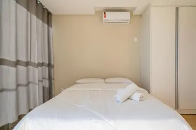 Uma cama ou camas num quarto em Casa 2Q c/ churrasq. 600m da praia RVL1183