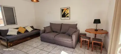 Uma área de estar em Casa Ensolarada