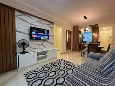Uma televisão e/ou sistema de entretenimento em 518 - Apartamento com 3 quartos em Bombas