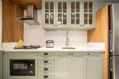 A cozinha ou kitchenette de Apto moderno c/vista mar em Porto Belo SC MRE801