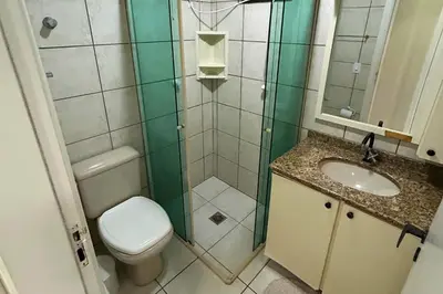 Uma casa de banho em Apartamento com vista mar e excelente localização