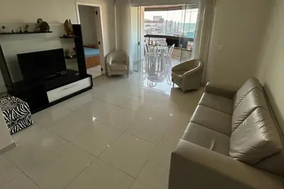 Uma área de estar em Apartamento com vista mar e excelente localização