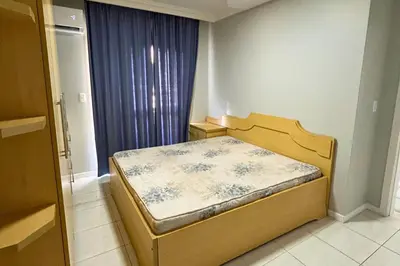 Uma cama ou camas num quarto em Aluguel Cobertura com piscina vista mar em Bombas