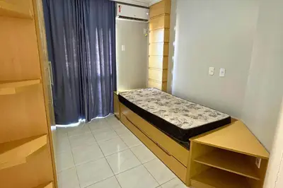 Uma cama ou camas num quarto em Aluguel Cobertura com piscina vista mar em Bombas