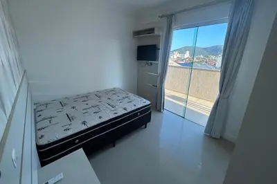 Uma cama ou camas num quarto em Cobertura com 03 dormitórios