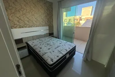 Uma cama ou camas num quarto em Cobertura com 03 dormitórios