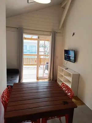 Uma televisão e/ou sistema de entretenimento em Apartamentos Lagoinha
