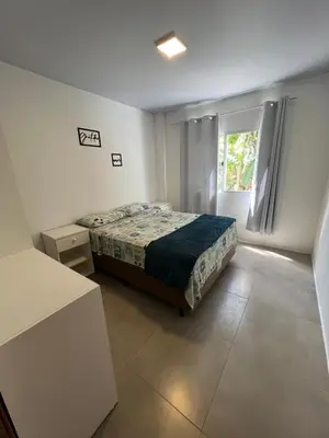 Uma cama ou camas num quarto em Apartamentos Lagoinha