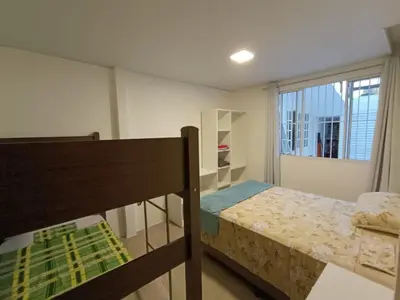 Uma cama ou camas num quarto em Apartamentos Lagoinha