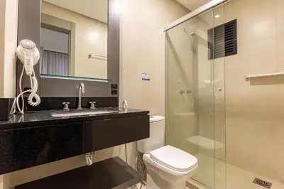 Uma casa de banho em Confortável Loft Duplex em Condomínio com Piscina