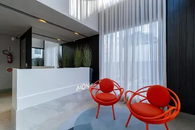 Uma área de estar em Confortável Loft Duplex em Condomínio com Piscina