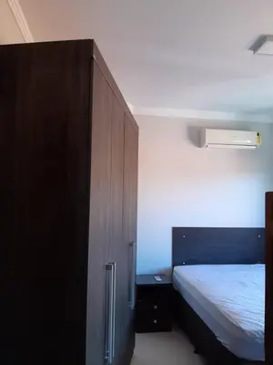 Uma cama ou camas num quarto em Residencial Giovana