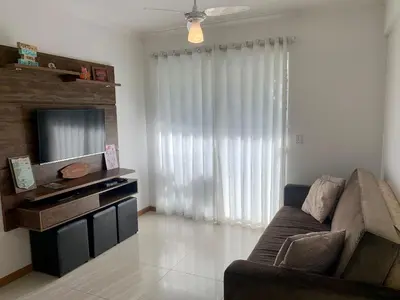 Uma área de estar em Residencial Viapiana - Condomínio no Centro de Bombinhas próximo a praia de 4 Ilhas