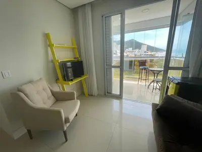 Uma área de estar em Cód 23 - Apartamento com vista para o mar