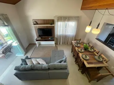 Uma área de estar em cód 6 · Casa Sofisticada á 50 m do mar