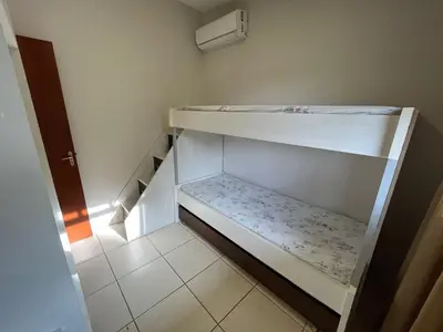 Uma cama ou camas num quarto em cód 4 · Casa com piscina próxima a praia de palmas
