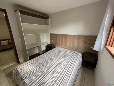 Uma cama ou camas num quarto em cód 4 · Casa com piscina próxima a praia de palmas