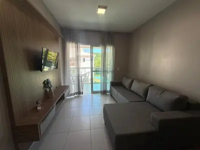 Uma televisão e/ou sistema de entretenimento em Cód 39 - Apartamento a 80 metros do Mar