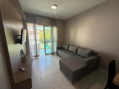 Uma área de estar em Cód 39 - Apartamento a 80 metros do Mar