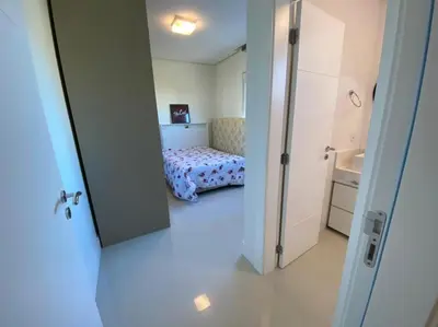 Uma cama ou camas num quarto em cód 20 - Apartamento frente mar com vista