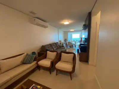 Uma área de estar em cód 20 - Apartamento frente mar com vista