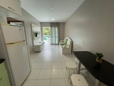 Uma área de estar em Cód 40 - Apartamento a 80 metros do Mar