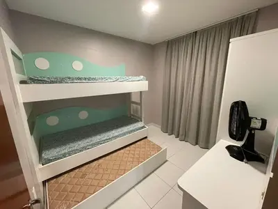 Uma cama ou camas num quarto em Cód 40 - Apartamento a 80 metros do Mar