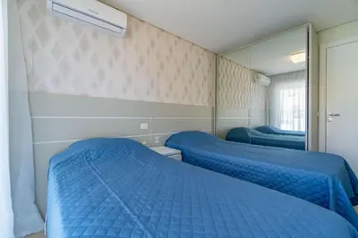 Uma cama ou camas num quarto em Cobertura Condo com Piscina e Jacuzzi - Boulevard Bombinhas