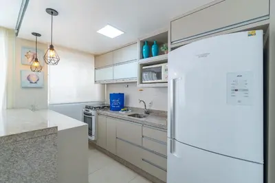 A cozinha ou kitchenette de Apartamento com Jacuzzi Privativa - Boulevard