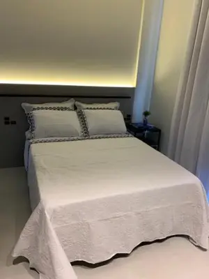 Uma cama ou camas num quarto em Apartamento confortável, Barra