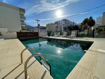 A piscina em ou perto de Cód 27 - Apartamento térreo com jacuzzi e área gourmet na Praia de Palmas