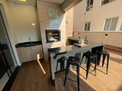 A cozinha ou kitchenette de Cód 27 - Apartamento térreo com jacuzzi e área gourmet na Praia de Palmas