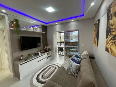 Uma área de estar em Cód 76 - Apartamento especular á 180 m do mar