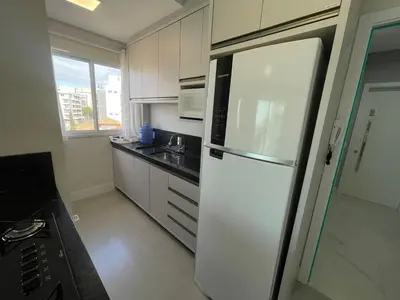 A cozinha ou kitchenette de Cód 126 - Apartamento aconchegante com 3 dormitórios