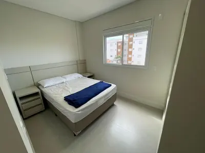 Uma cama ou camas num quarto em Cód 126 - Apartamento aconchegante com 3 dormitórios