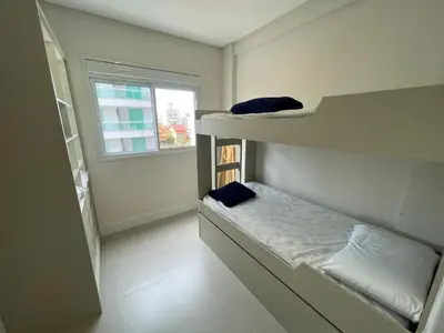 Uma cama ou camas num quarto em Cód 126 - Apartamento aconchegante com 3 dormitórios