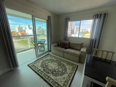 Uma área de estar em Cód 126 - Apartamento aconchegante com 3 dormitórios