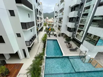 A piscina em ou perto de Cód 97 - Apto amplo e decorado a 280m do mar