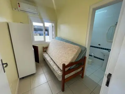 Uma cama ou camas num quarto em Cód 5 - Casa a poucos passos da praia de Palmas