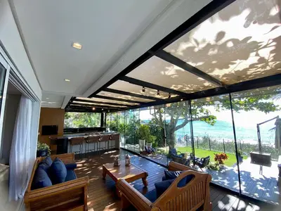 Uma área de estar em 415 - Casa frente mar para alugar Bombinhas com 4 suítes