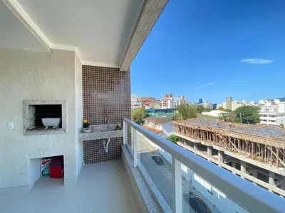 Uma varanda ou terraço em 451 - Lindo Apartamento de 3 dormitórios na praia de Bombas