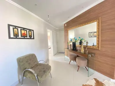 Uma área de estar em 451 - Lindo Apartamento de 3 dormitórios na praia de Bombas